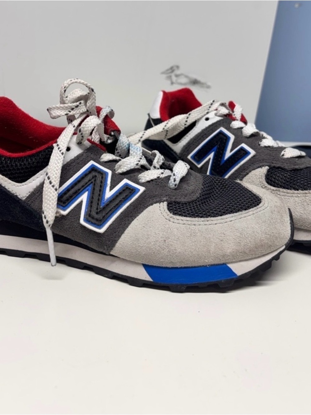 New Balance 574 shoes
'Magnet/Serene Blue' size 2.5